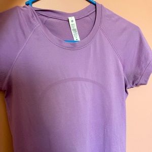 Lululemon size 6  swiftly tech shirt in wisteria purple
